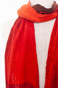 Neeru Kumar pure wool crinkle finish shibori scarf in crimson and deep indigo..