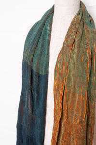 Neeru Kumar pure silk shibori pleat scarf in deep green and gold.