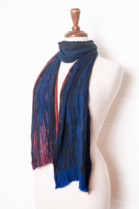 Neeru Kumar pure wool crinkle finish shibori scarf in ruby red and cobalt blue.
