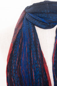 Neeru Kumar pure wool crinkle finish shibori scarf in ruby red and cobalt blue.