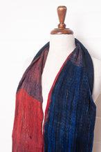 Load image into Gallery viewer, Neeru Kumar pure wool crinkle finish shibori scarf in ruby red and cobalt blue.