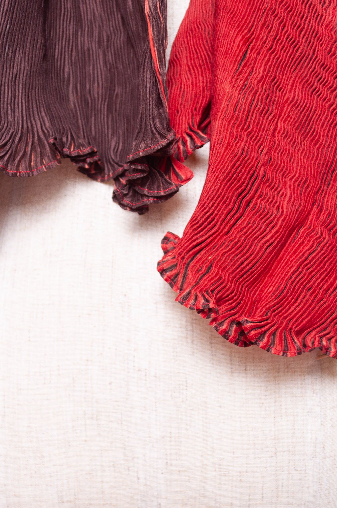 Neeru Kumar pure silk shibori pleat scarf in crimson red and deep burgundy.