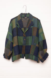 Neeru Kumar handwoven wool blanket check cropped loose fit jacket in indigo navy and emerald green.