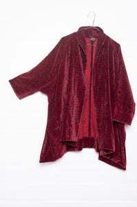 Neeru Kumar ruby red cotton velvet blockprinted A-line swing jacket.