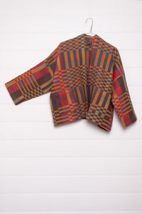 Neeru Kumar handwoven wool check kimono cropped jacket in olive, red, orange, mustard and charcoal.