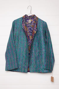 DVE Collection one of a kind reversible silk kantha Neeli jacket has a small floral print on cerulean blue on one side,  and a paisley on the reverse on cobalt blue.