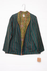 DVE Collection one of a kind reversible silk kantha Neeli jacket is deep emerald green on one side,  and a small floral print on the reverse on olive green.