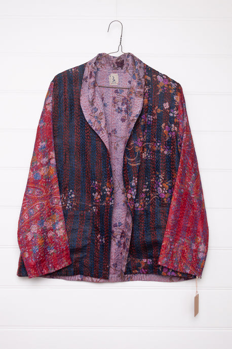 DVE Collection one of a kind reversible silk kantha Neeli jacket has a floeral print on deep purple and crimson one side,  and a small floral print on the reverse on soft violet.