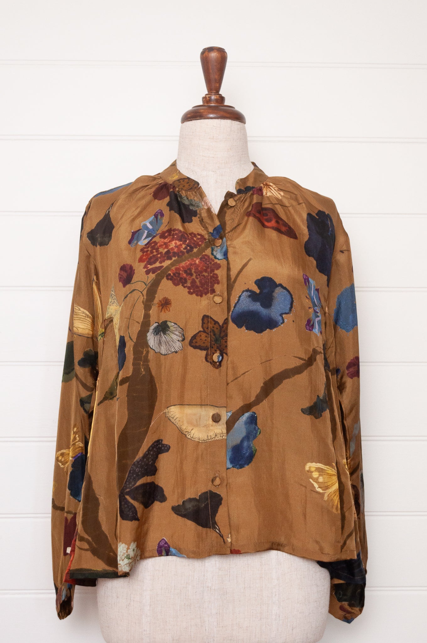 Yavi Tawny silk blouse in Vine garden print on mustard.