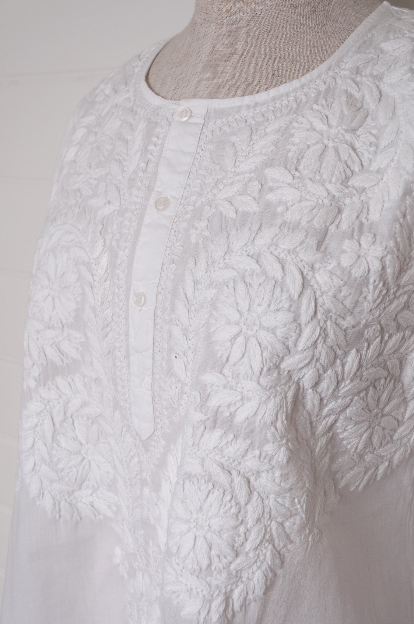White on white embroidery chikankari cotton kurta button up top.