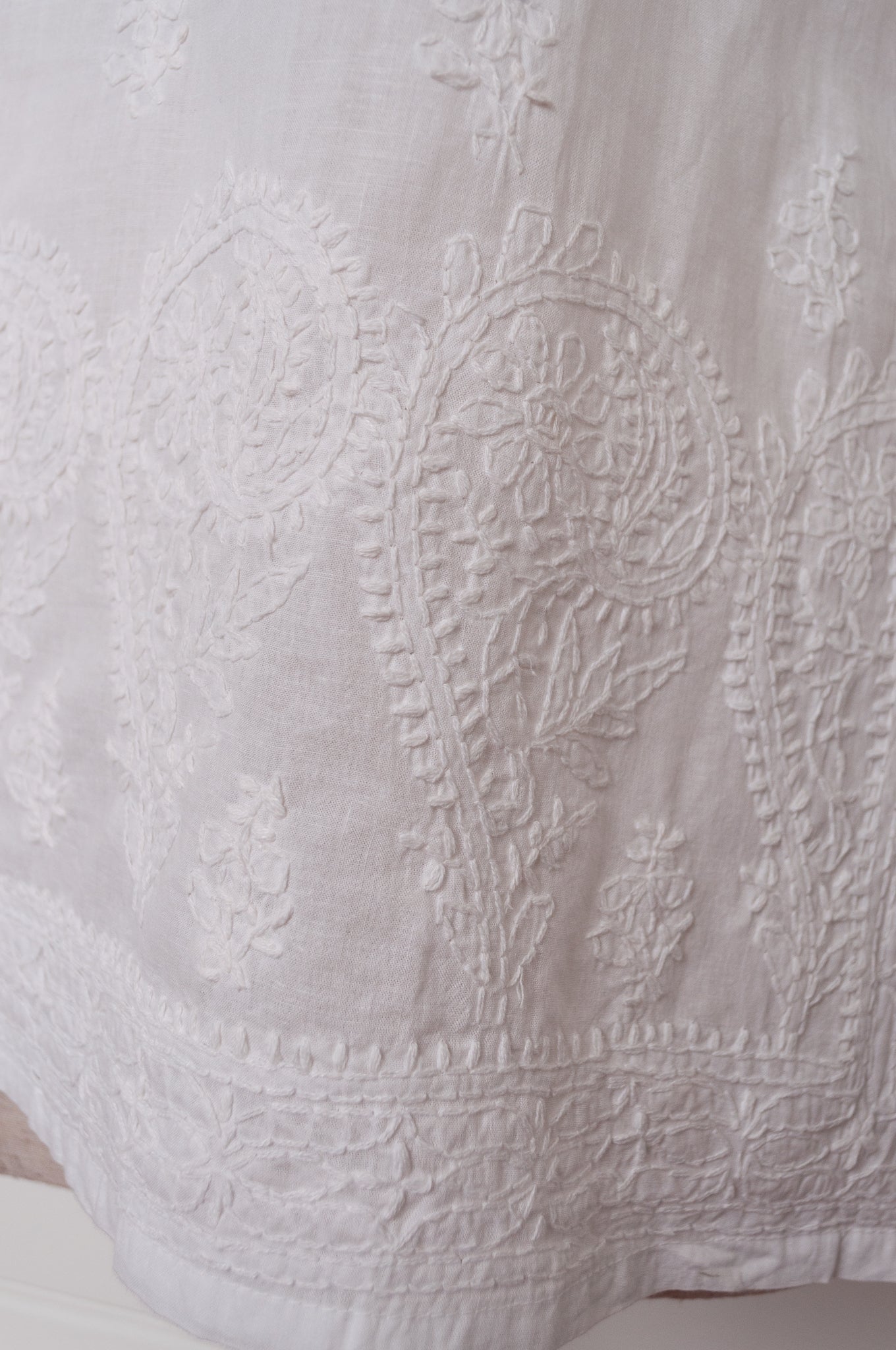 White on white embroidery chikankari cotton kurta top.