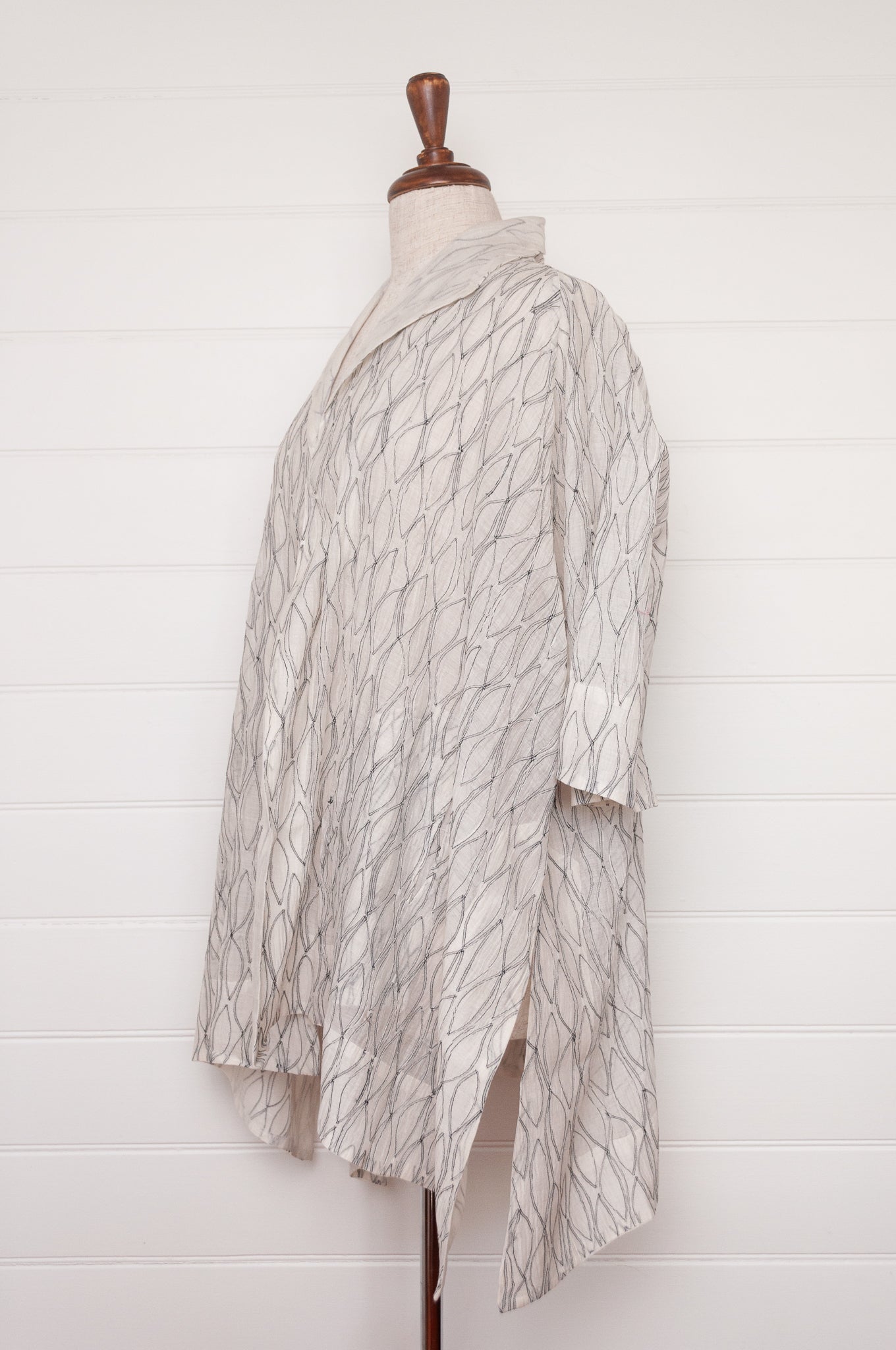 Classic Neeru Kumar cotton silk oversized kimono jacket in white, with black embroidery and unlined.