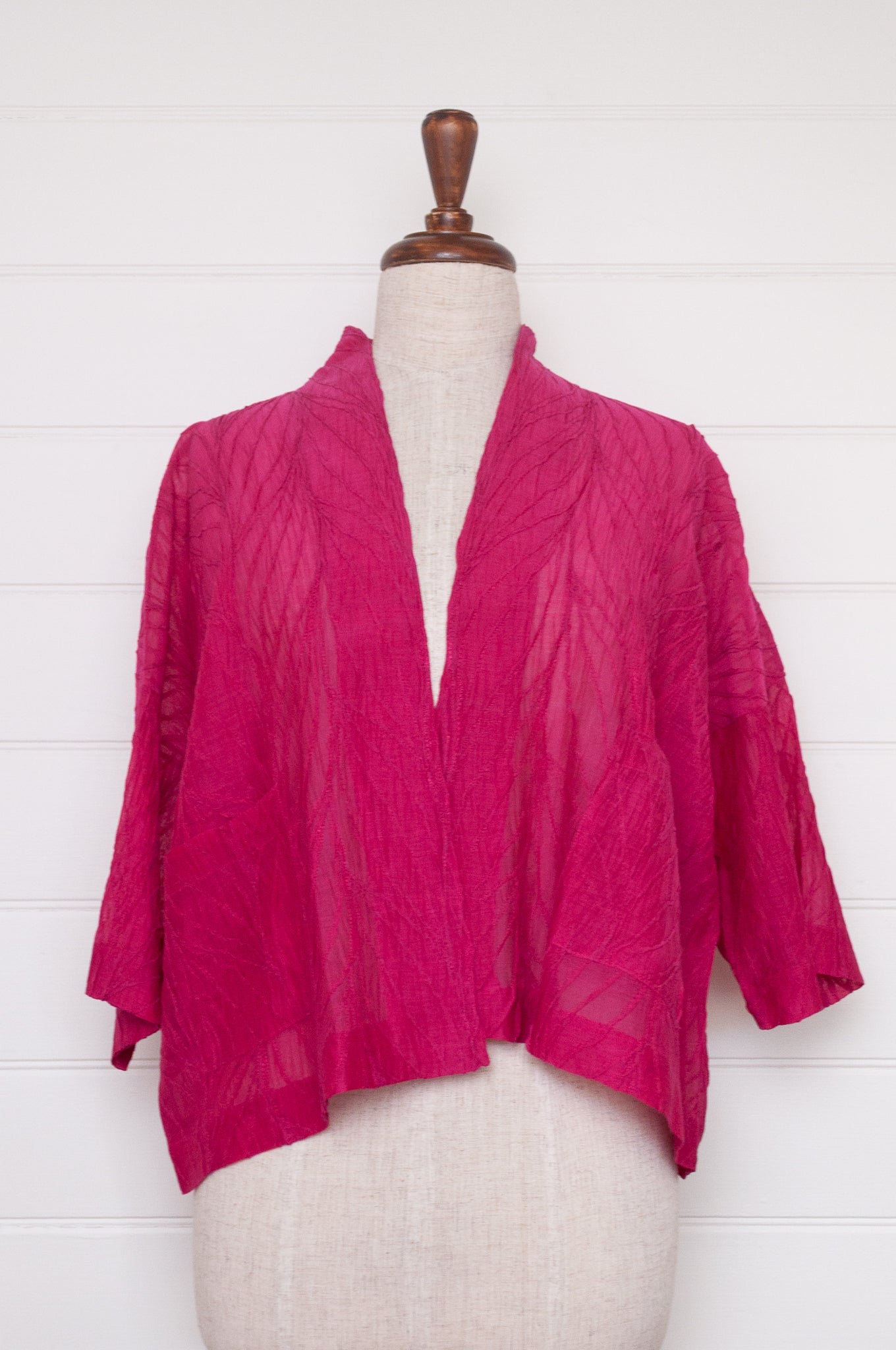 Classic Neeru Kumar cotton silk kimono jacket in bright magenta pink, embroidered and unlined.