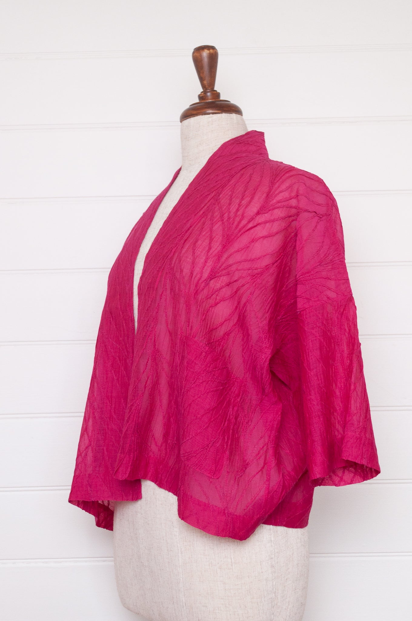 Classic Neeru Kumar cotton silk kimono jacket in bright magenta pink, embroidered and unlined.