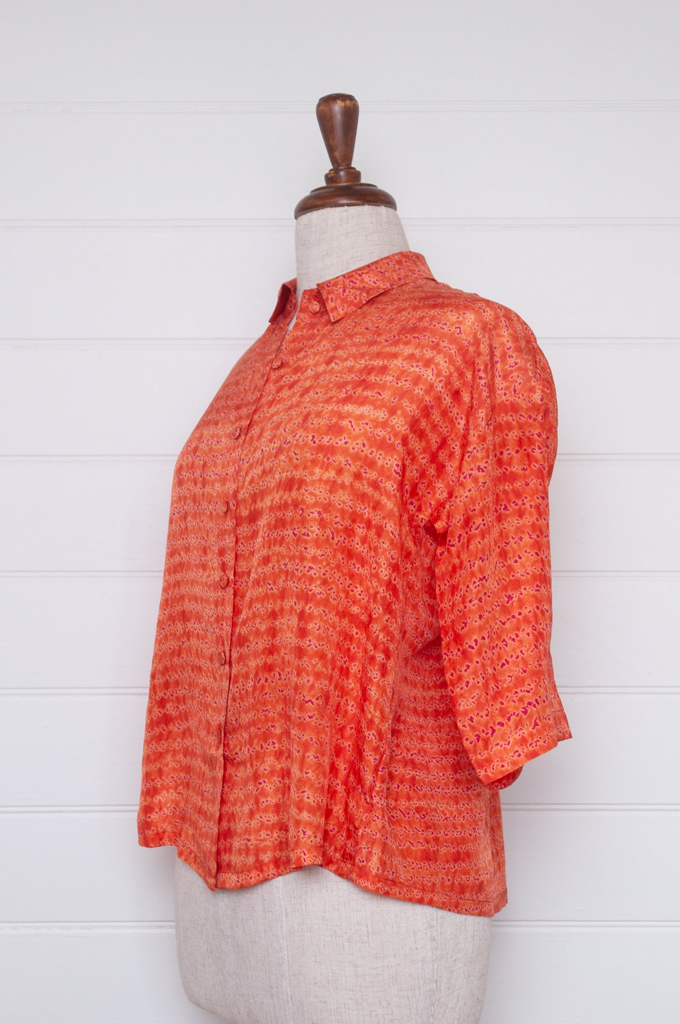 Neeru Kumar coral and pink silk shibori short sleeve blouse.