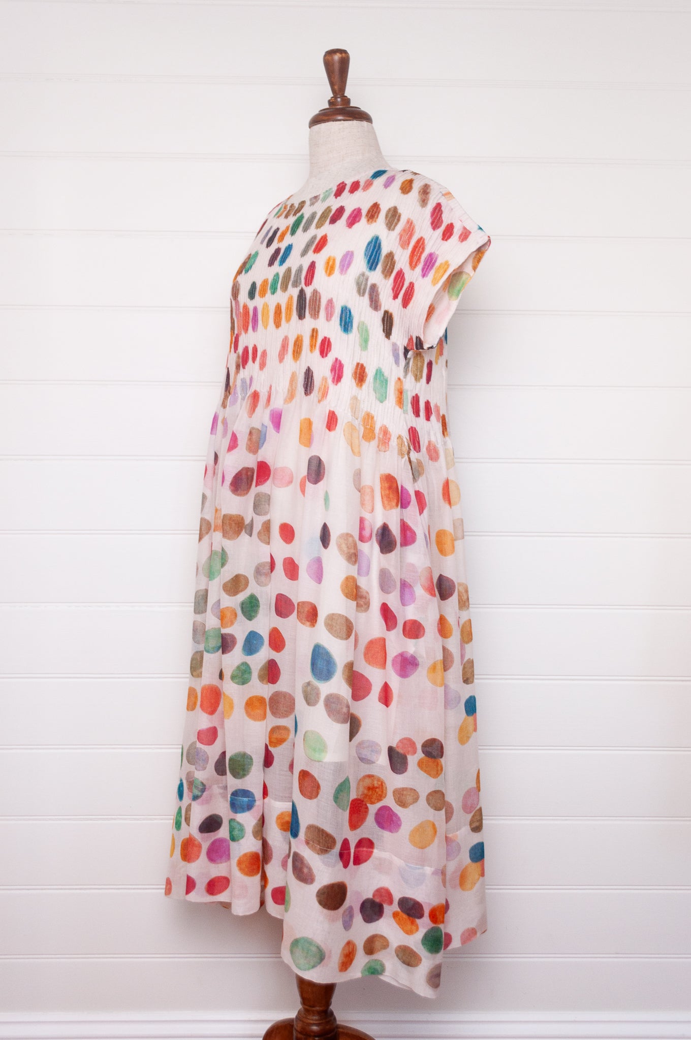 Neeru Kumar fine cotton sun dress with pintucked bodice and cap sleeves. Large multi coloured spots on white.