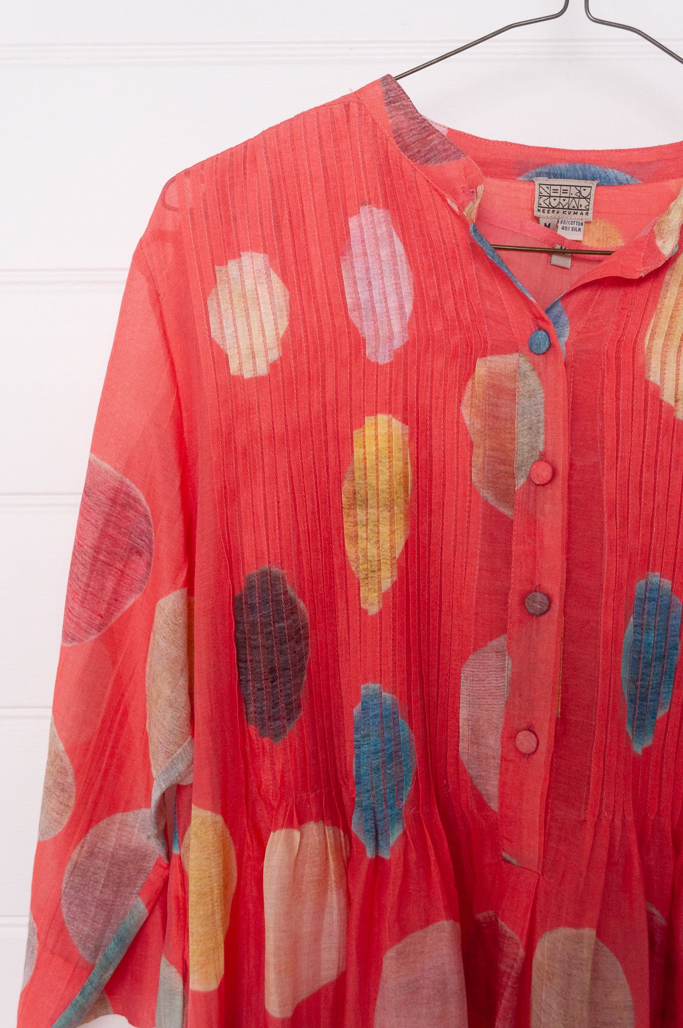 Neeru Kumar fine cotton silk tunic with multi colour spots on peach pink.