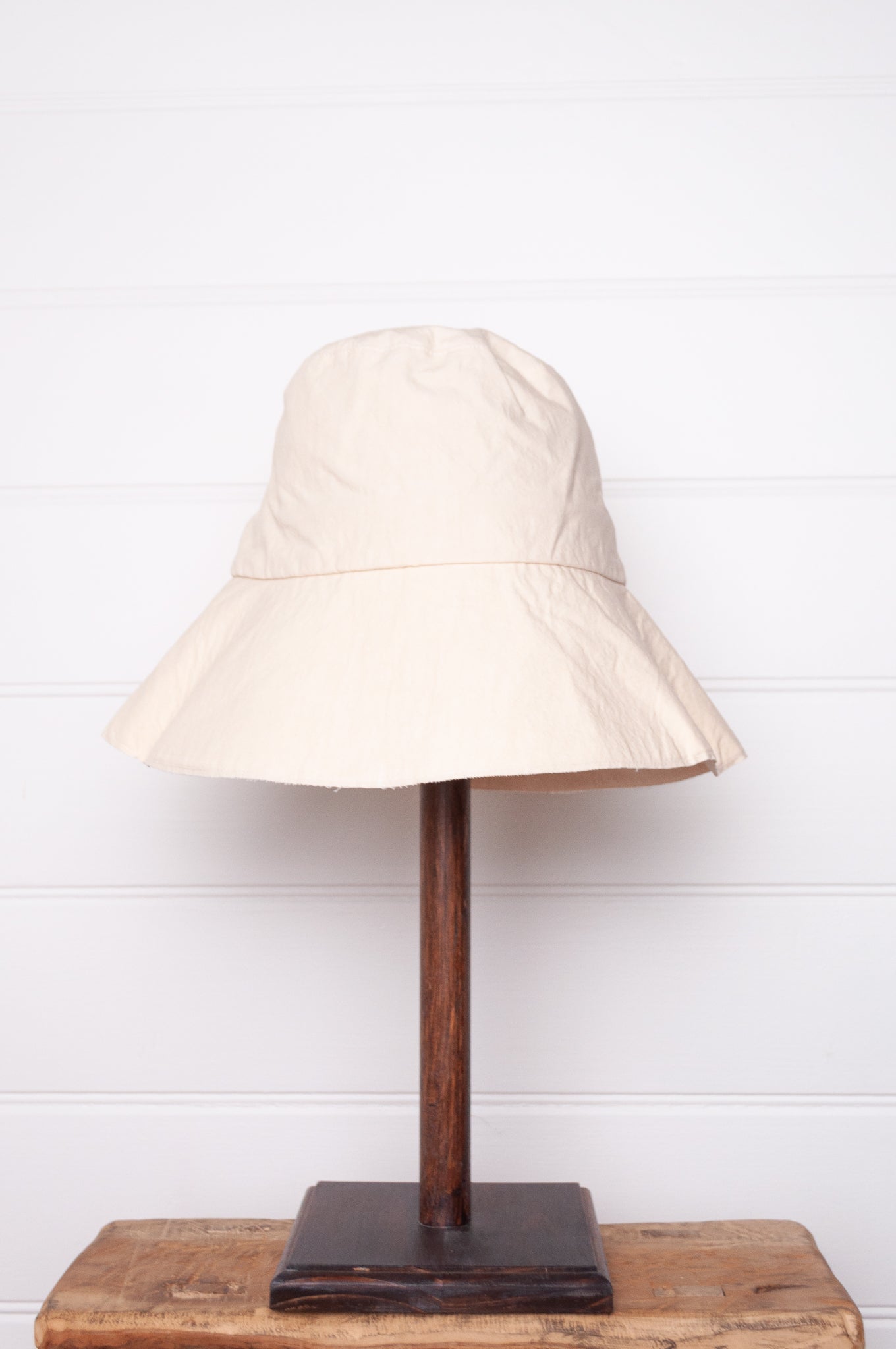 PCNQ made in Japan cotton bucket hat in ivory with generous brim.