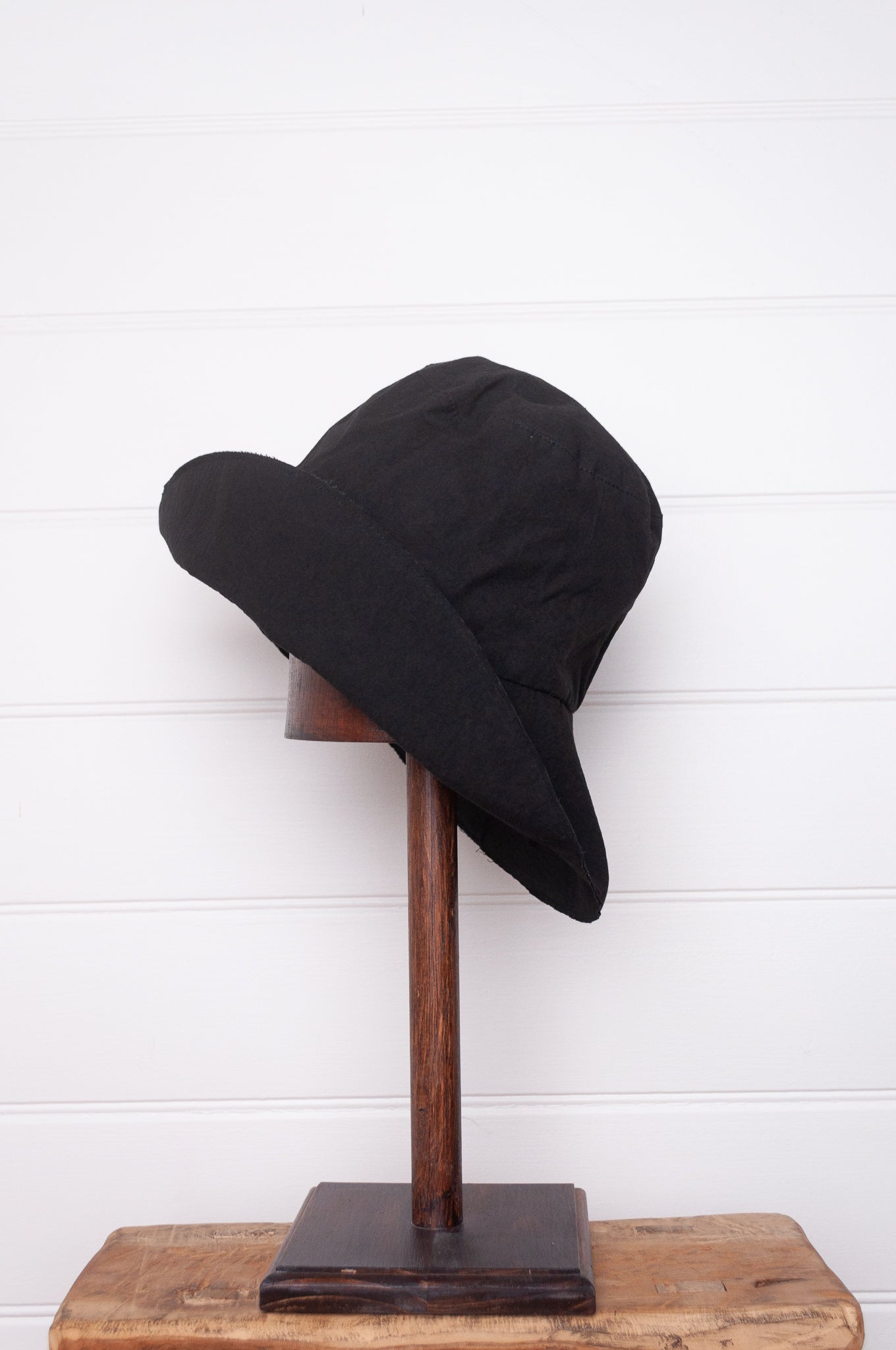 PCNQ made in Japan cotton bucket hat in black with generous brim.