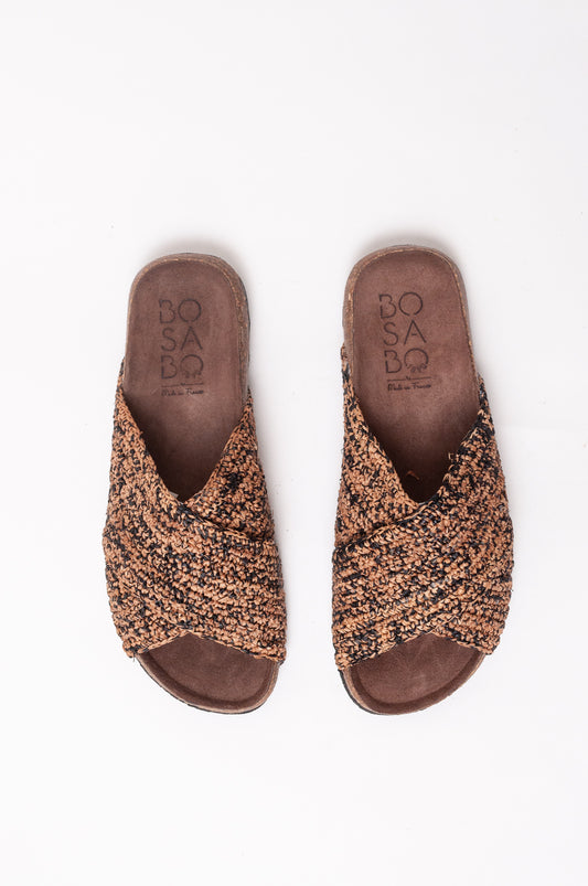 Bosasbo handmade in France cross over slides with molded cork footbed and hand crocheted natural and black chine raffia upper.
