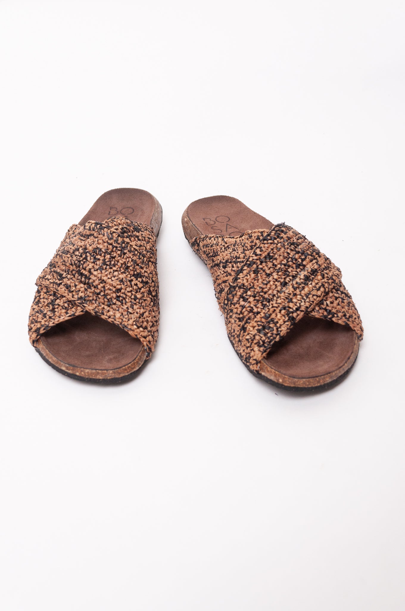Bosasbo handmade in France cross over slides with molded cork footbed and hand crocheted natural and black chine raffia upper.