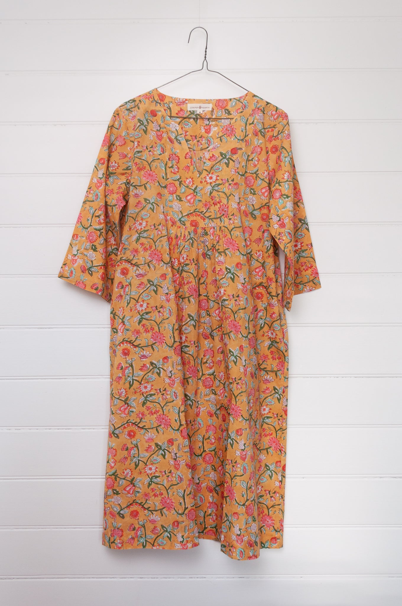 Juniper Hearth blockprint cotton Thea 3/4 sleeve dress in saffron yellow floral design.