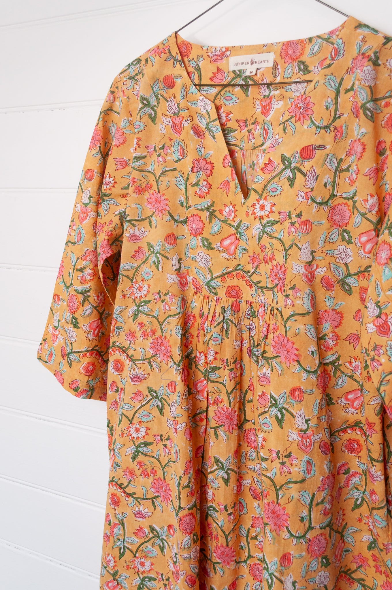 Juniper Hearth blockprint cotton Thea 3/4 sleeve dress in saffron yellow floral design.