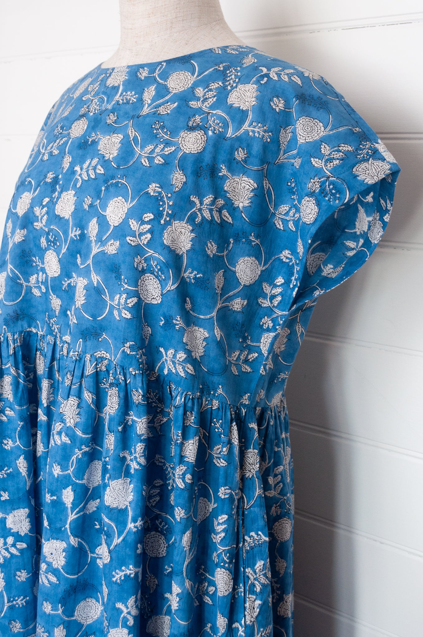 Juniper Hearth blockprint cotton dress with gathered skirt and pockets, in blue and white floral.