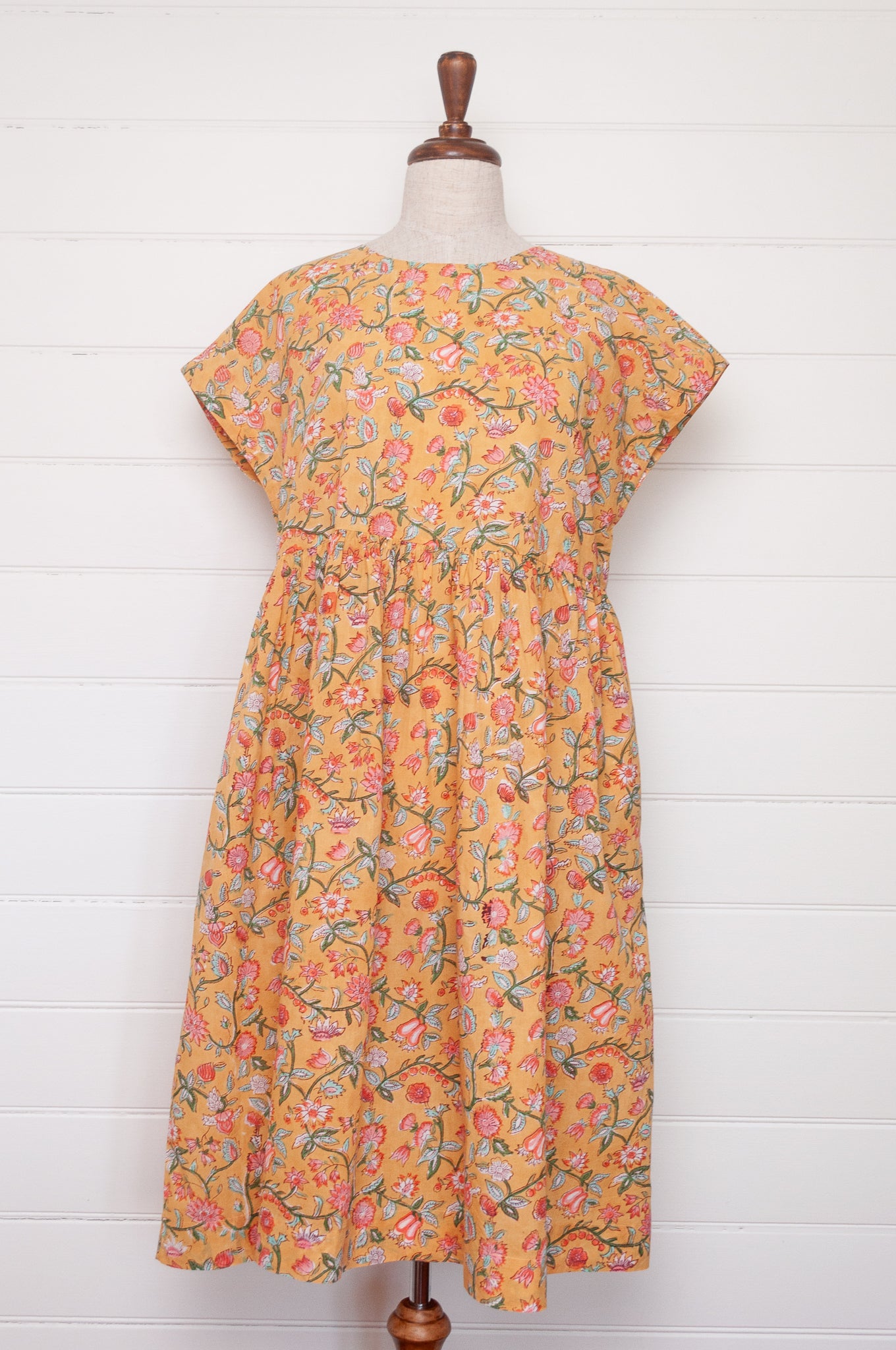 Juniper Hearth blockprint cotton dress with gathered skirt and pockets, in mustard floral.