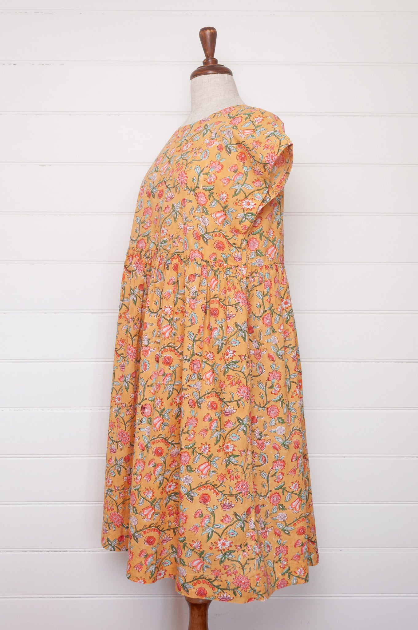 Juniper Hearth blockprint cotton dress with gathered skirt and pockets, in mustard floral.