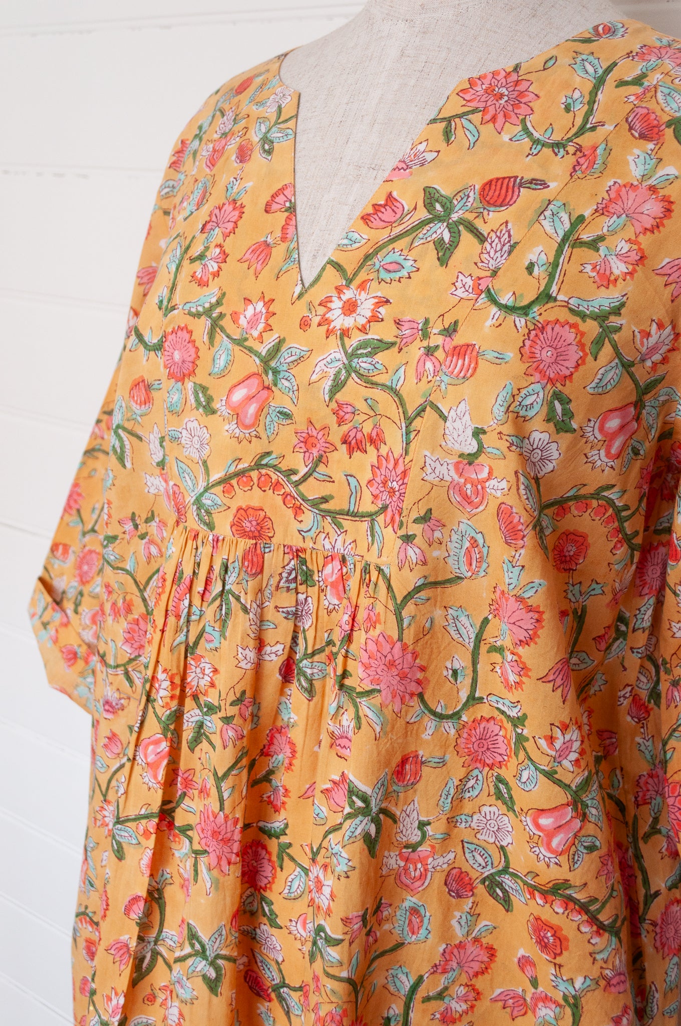 Juniper Hearth blockprint cotton Thea 3/4 sleeve dress in saffron yellow floral design.
