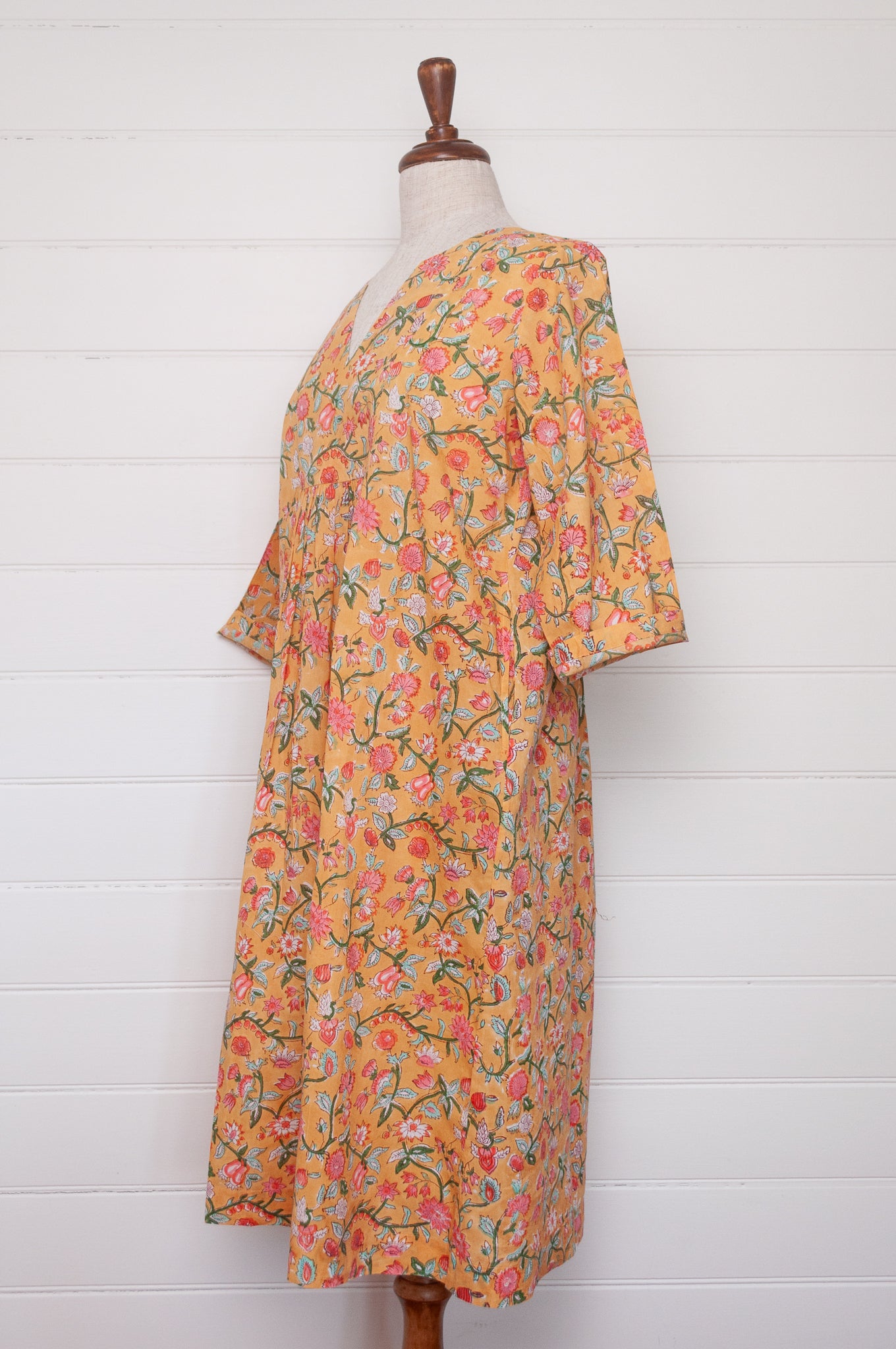 Juniper Hearth blockprint cotton Thea 3/4 sleeve dress in saffron yellow floral design.