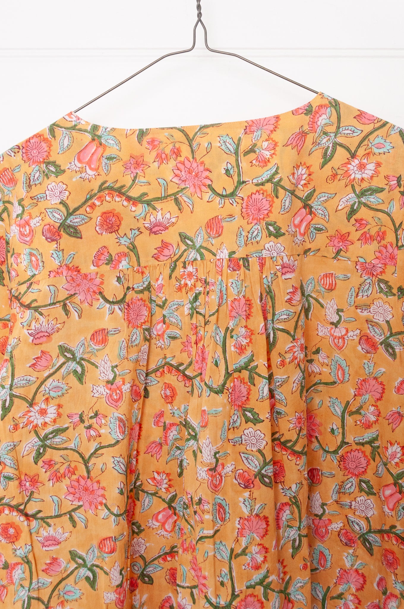 Juniper Hearth blockprint cotton Thea 3/4 sleeve dress in saffron yellow floral design.
