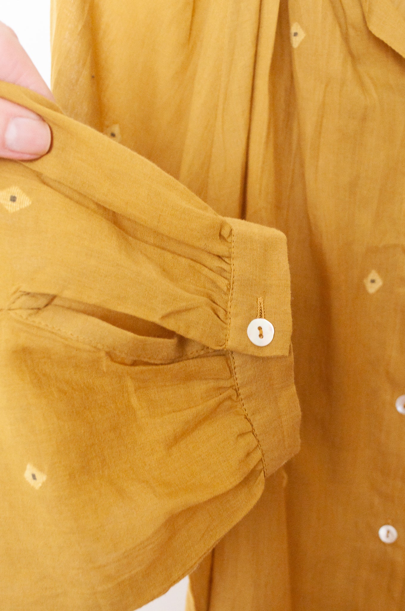 Studio Within x Juniper Hearth jamdani cotton blouse in marigold mustard yellow.