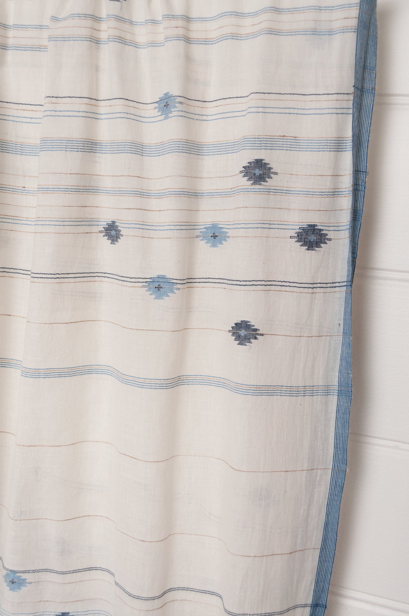 Karomi jamdani scarf handwoven in handspun natural cotton and natural dyes, kankra crab motif with stripes.