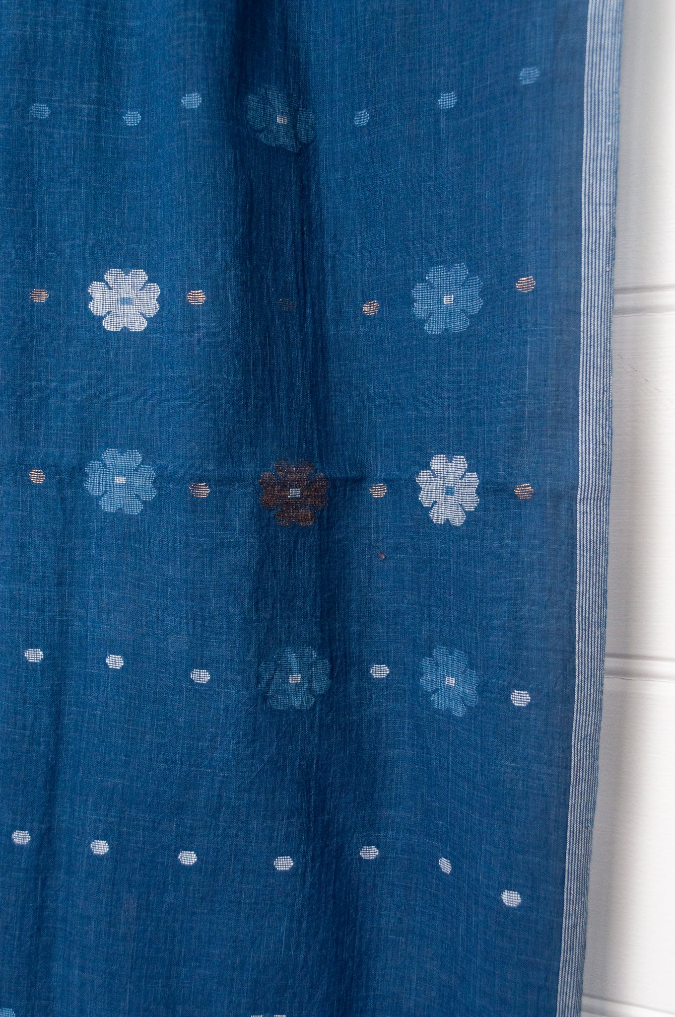 Karomi jamdani handspun handwoven cotton scarf Sishumi floral and spot on deep indigo.
