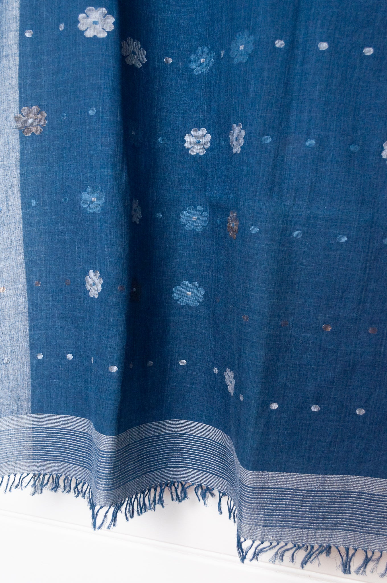 Karomi jamdani handspun handwoven cotton scarf Sishumi floral and spot on deep indigo.
