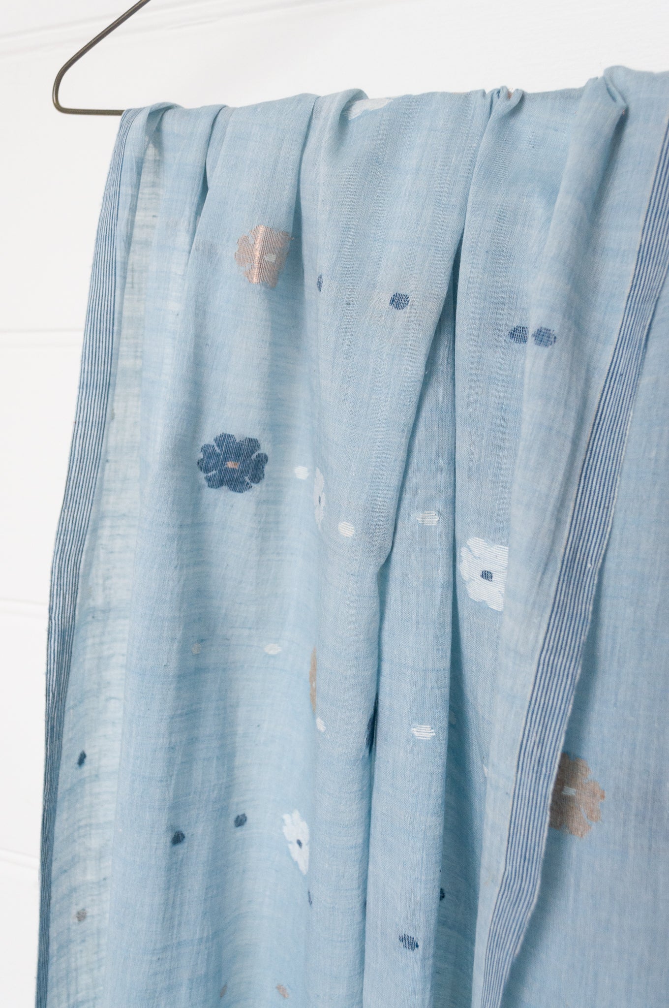 Karomi jamdani handspun handwoven cotton scarf Sishumi floral and spot on light indigo.