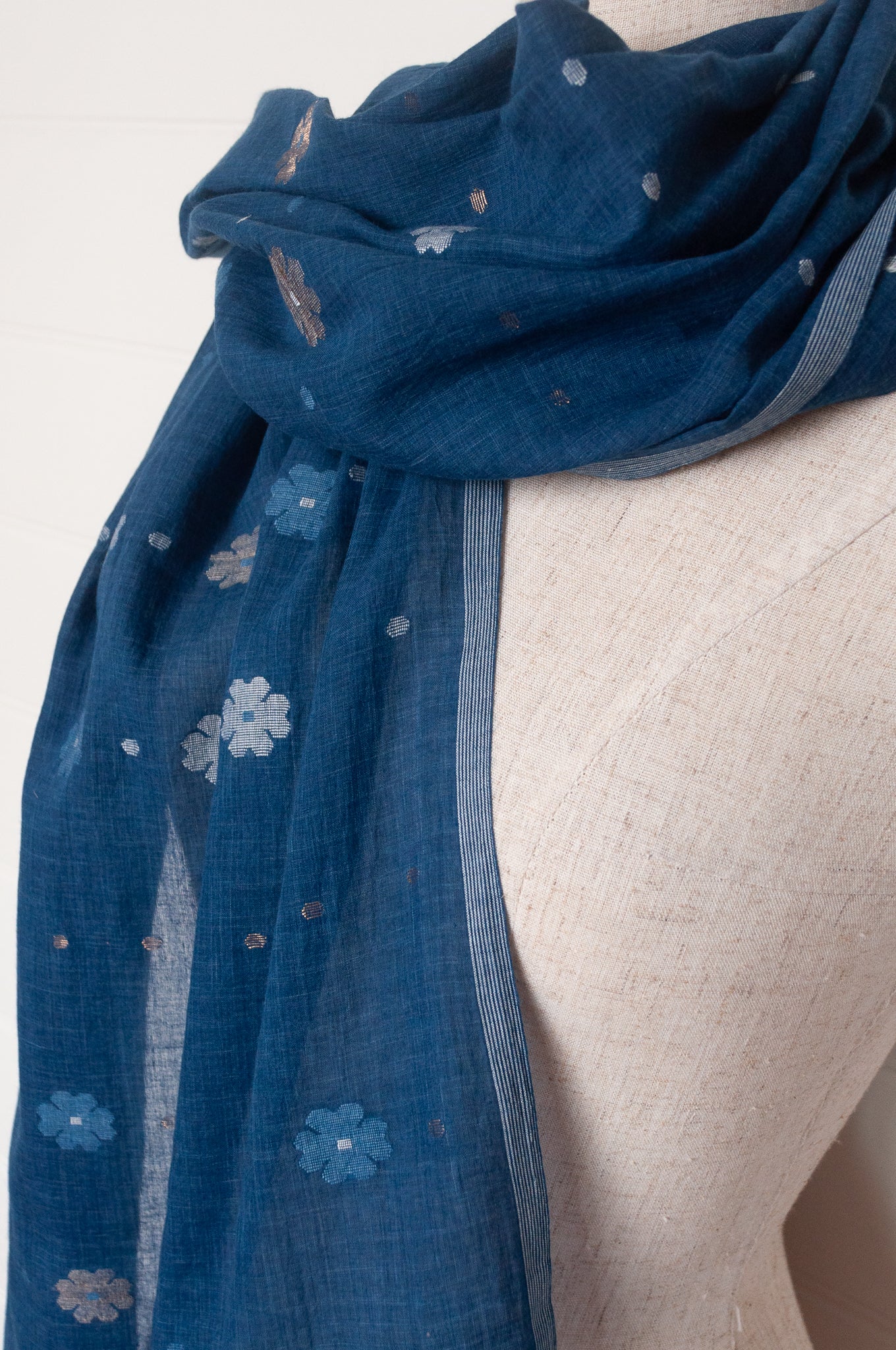 Karomi jamdani handspun handwoven cotton scarf Sishumi floral and spot on deep indigo.