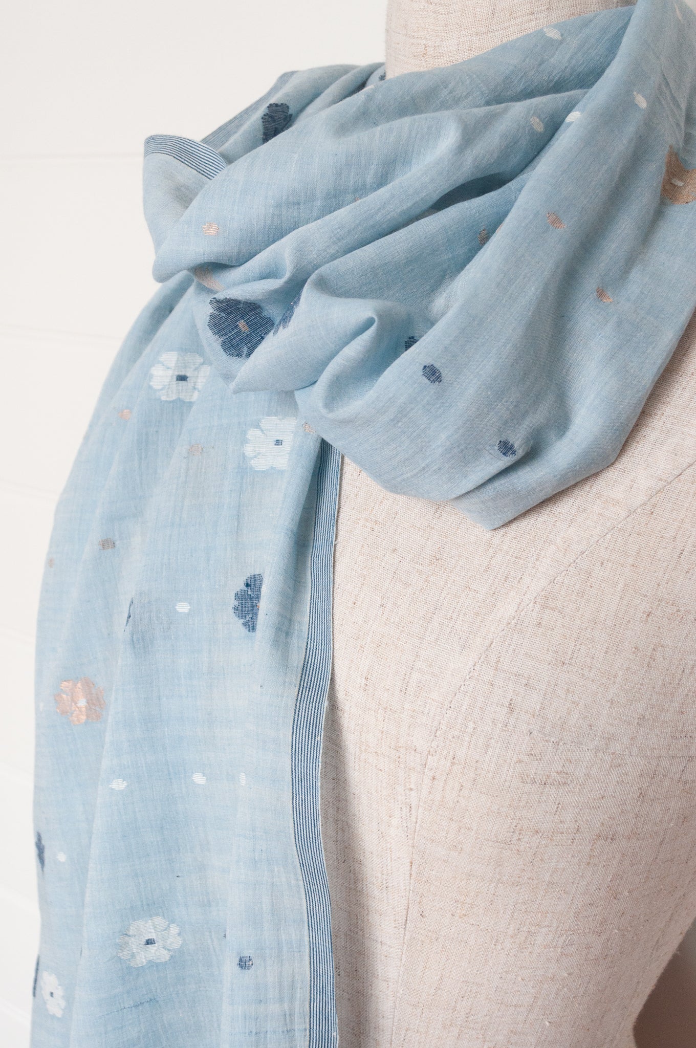 Karomi jamdani handspun handwoven cotton scarf Sishumi floral and spot on light indigo.