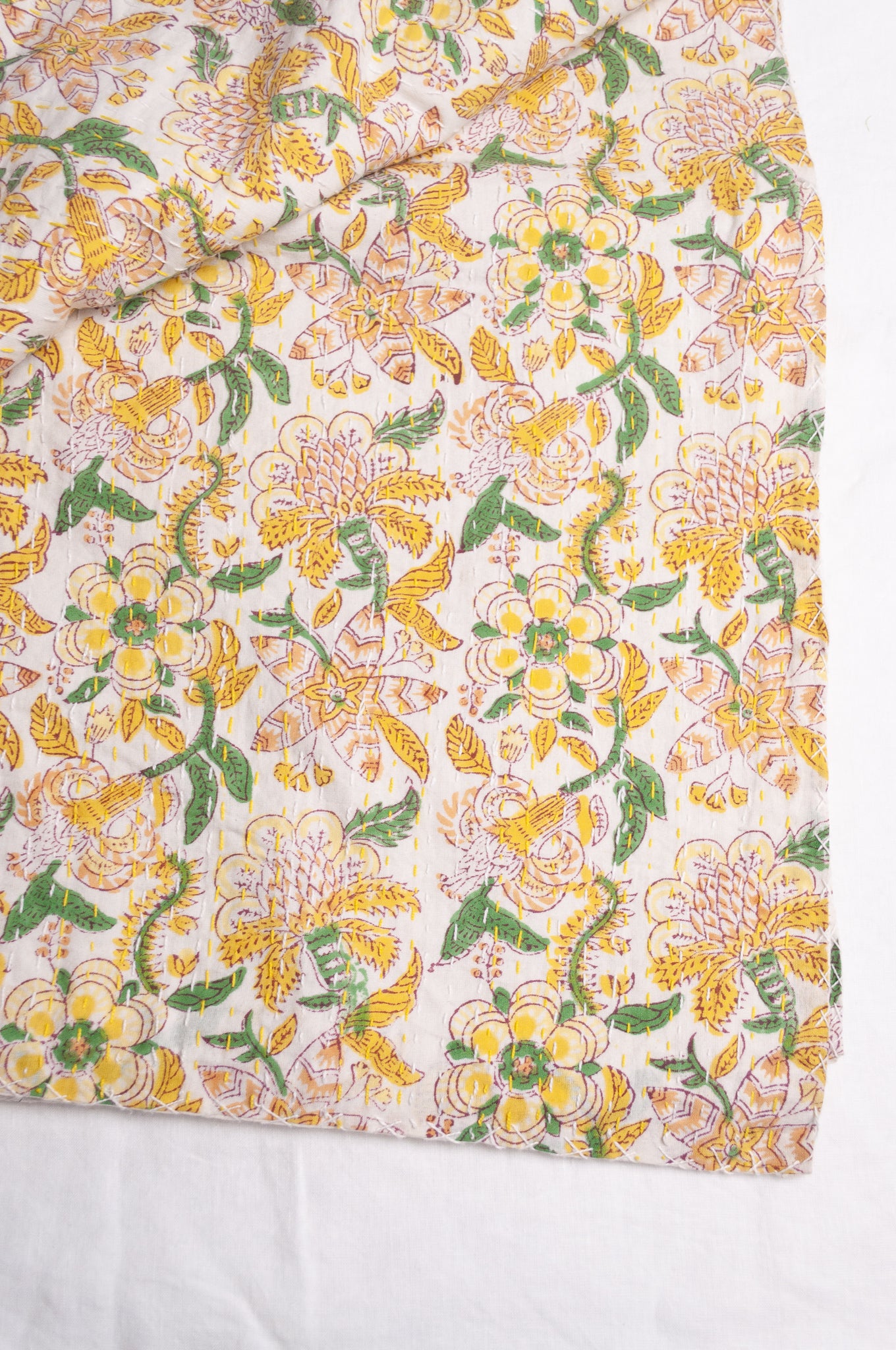 Hand stitched block print pure cotton kantha quilt lemon yellow pink and green floral.