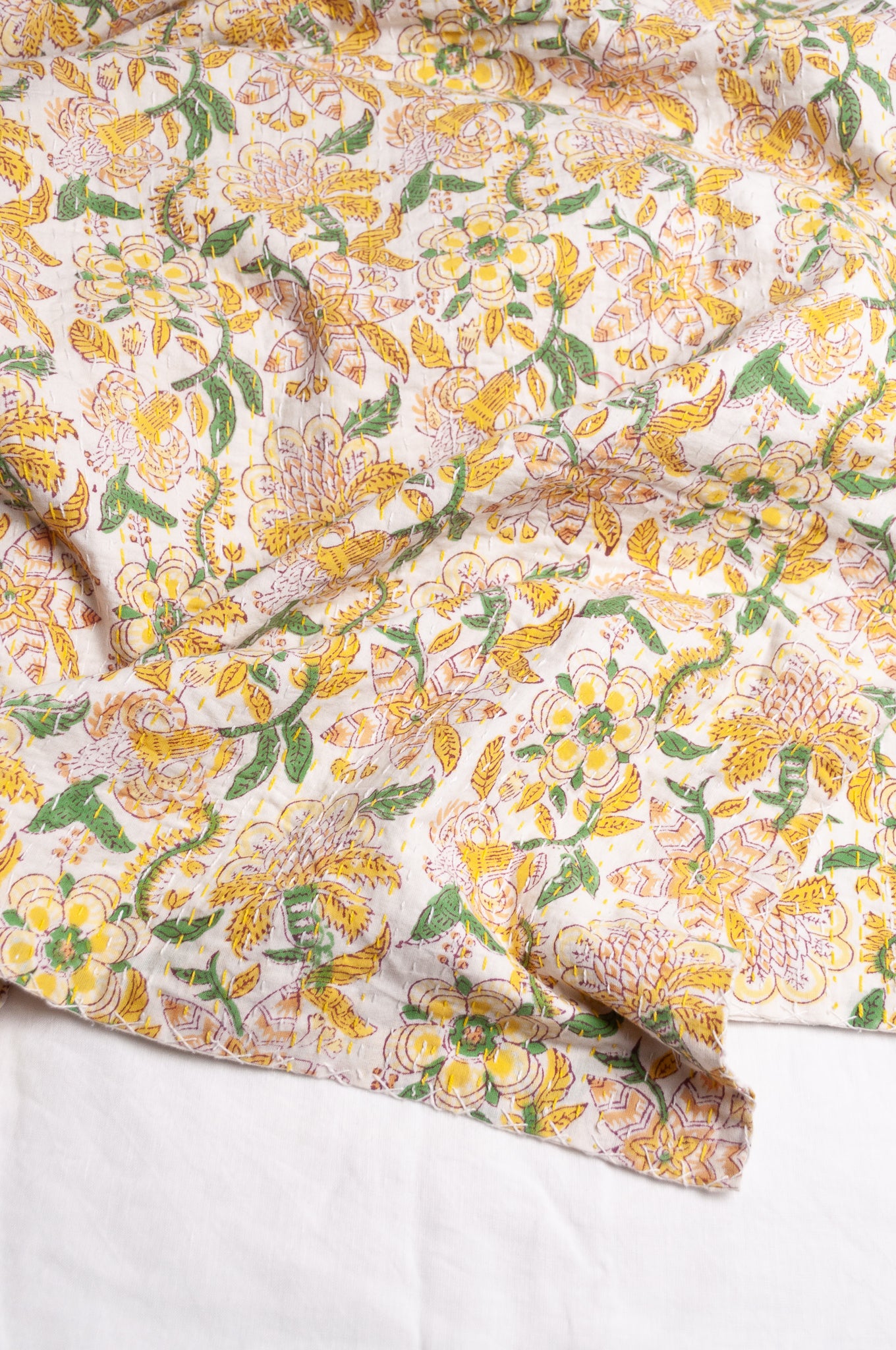 Hand stitched block print pure cotton kantha quilt lemon yellow pink and green floral.