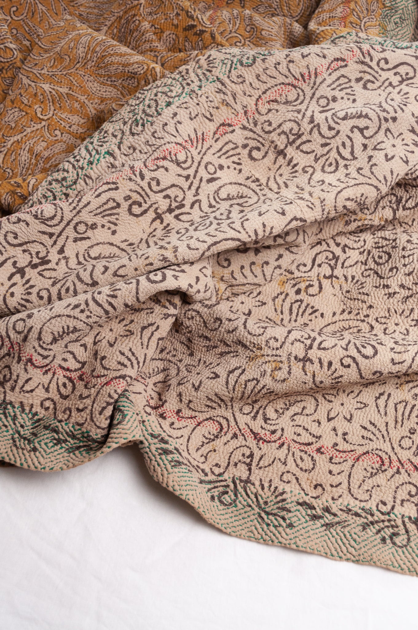 Bagru over print vintage blockprint kantha quilt, mustard leaf design.