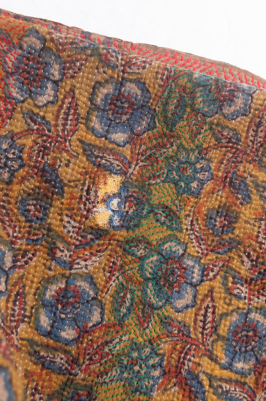 Bagru overdye blockprint vintage kantha quilt in rust red and denim blue on mustard and olive.