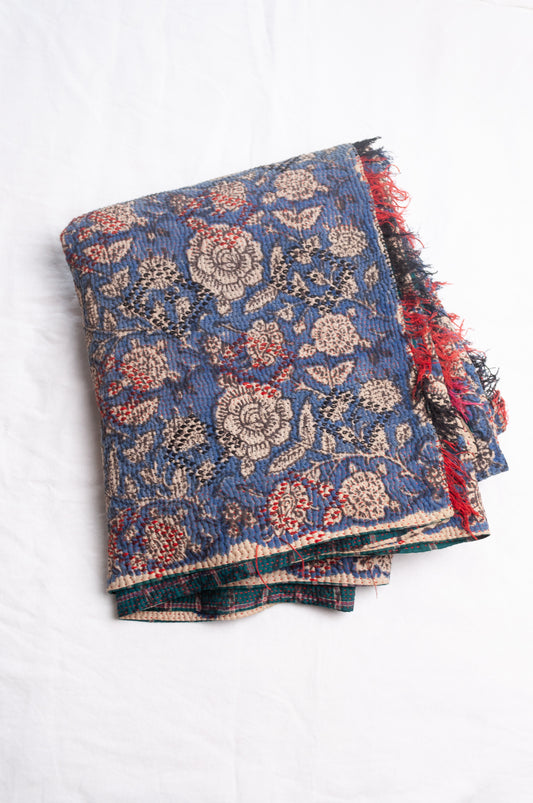 Bagru over print vintage blockprint kantha quilt, floral on denim blue with red embroidery and green plaid reverse.