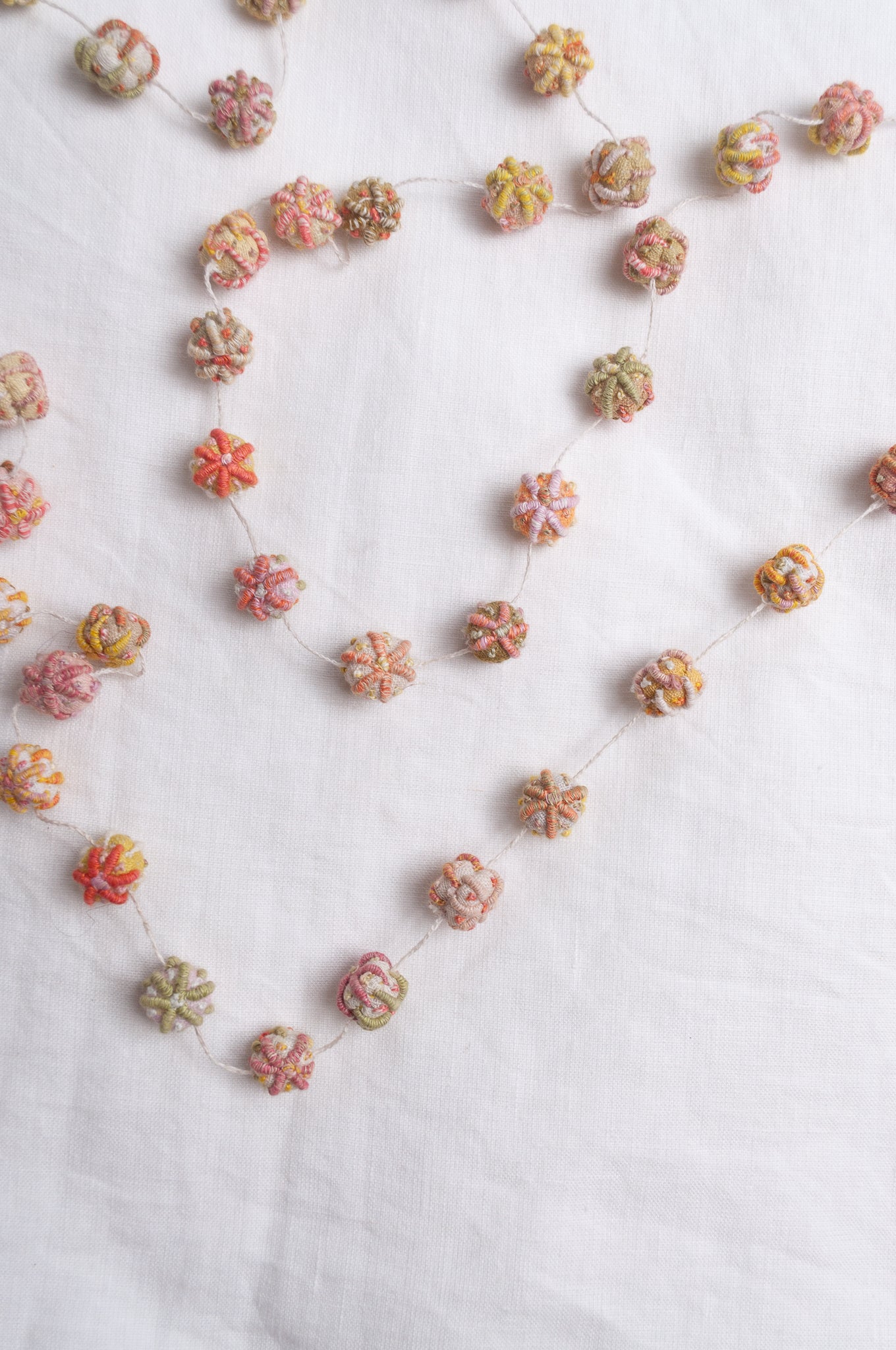 Sophie Digard linen bead embroidered necklace in fresh natural tones.