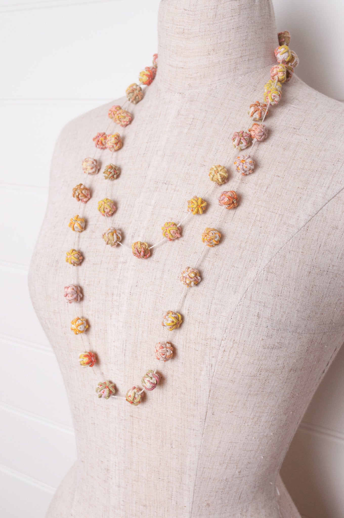 Sophie Digard linen bead embroidered necklace in fresh natural tones.