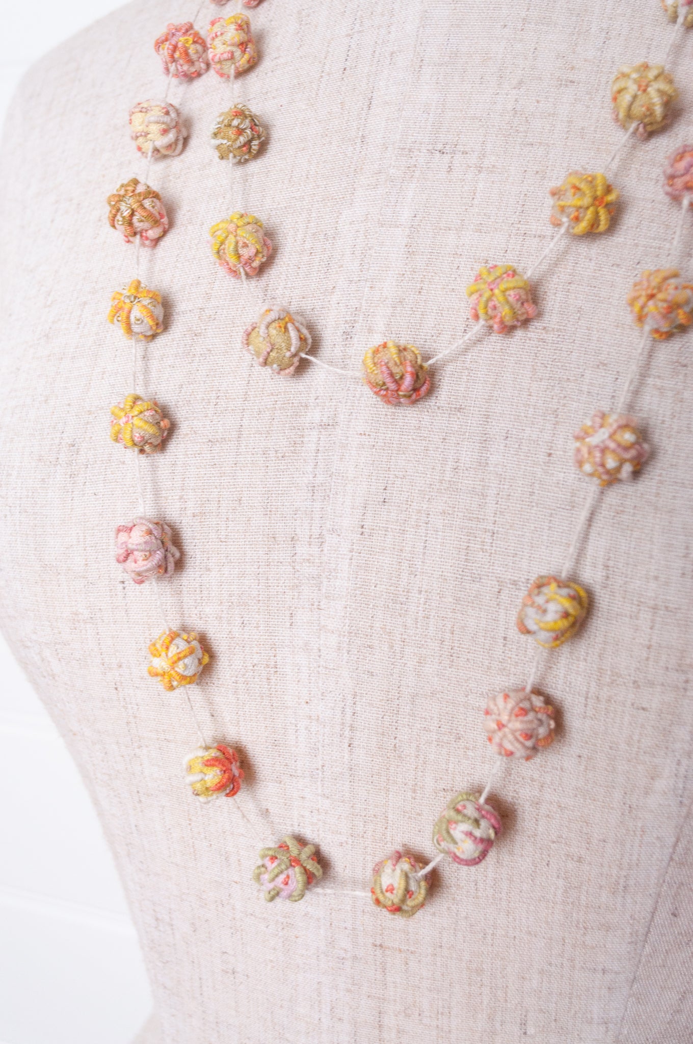 Sophie Digard linen bead embroidered necklace in fresh natural tones.