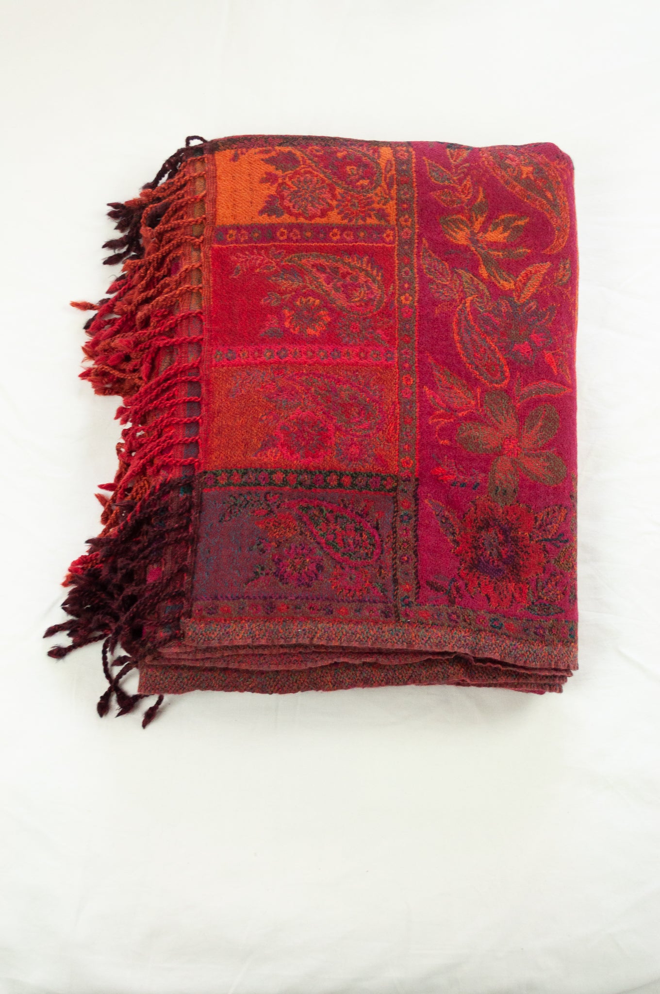 Tasseled wool throw - magenta floral