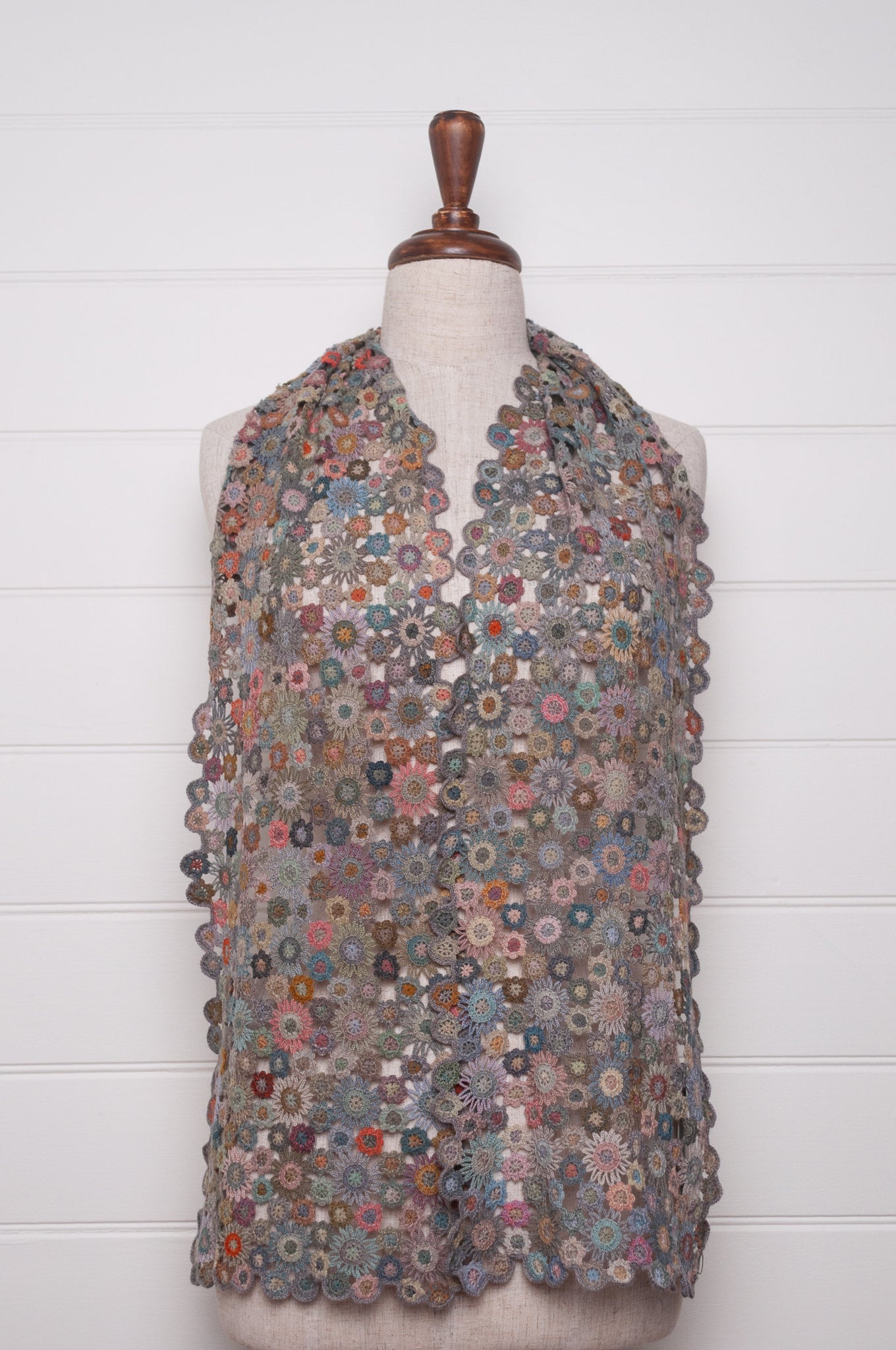 Sophie Digard fleurs etoilees star flower crochet scarf in soft palette of mauves and pinks.